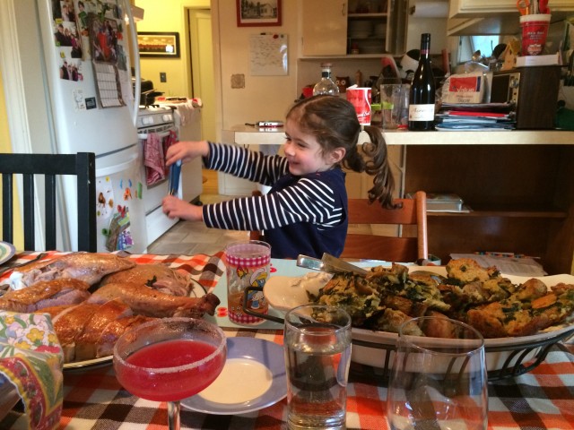 Josie helping set the table