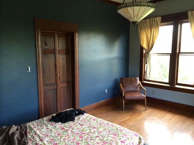 Our painting and taping teams (Peter and Chips) worked their magic on the master bedroom as well. We did one navy wall and three grey walls. The room gets so much light, the navy is still bright.